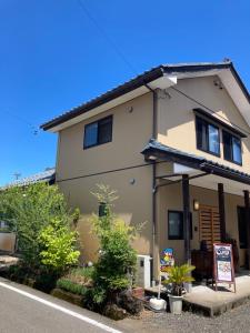 a building with a sign in front of it at Minshuku Miyoshi - Vacation STAY 14454v in Echizen