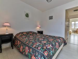 Postel nebo postele na pokoji v ubytování Les Bains de Mer