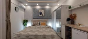 Voodi või voodid majutusasutuse GOLD APARTMANI toas