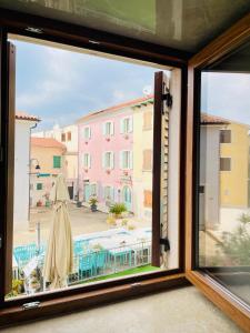 Bazén v ubytovaní Fazana City Rooms with free parking alebo v jeho blízkosti