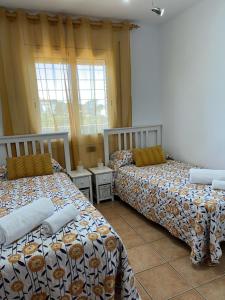 Posteľ alebo postele v izbe v ubytovaní Casa San Roca