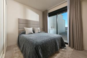 Posteľ alebo postele v izbe v ubytovaní Penthouse with ocean view 4 bedrooms apartment
