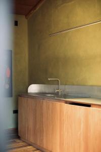 a kitchen with a sink and a counter top at Design Apartment in Downtown Cusco in Cusco