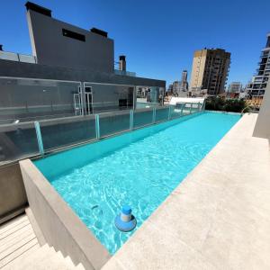 a swimming pool on the roof of a building at Arevalo 2700 - Las Cañitas in Buenos Aires