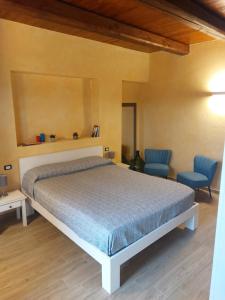 Postel nebo postele na pokoji v ubytování AGRITURISMO DA RICCARDO