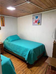 Llit o llits en una habitació de Amukan Lodge