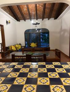 a large room with a large fish tank in the background at casa mangos in Temixco
