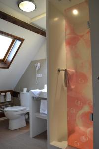 Ванна кімната в Le Domaine des Cigognes