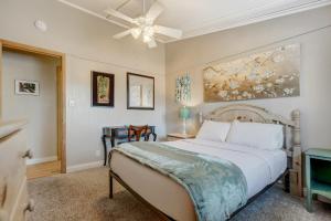 a bedroom with a bed and a ceiling fan at 4BR Colorado Get Away With Gym! in Colorado Springs