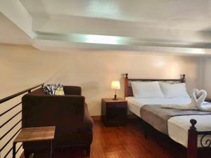 Postel nebo postele na pokoji v ubytování Pal-Watson Apartments