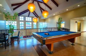 a billiard room with a pool table in a building at Hotel Palacio Puerto Princesa in Puerto Princesa City