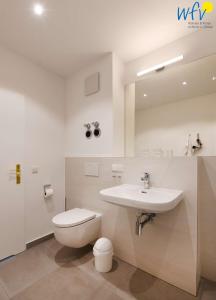 Et badeværelse på Haus am Hövt - Ferienwohnung 8