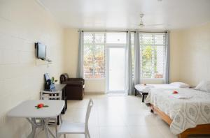 Postel nebo postele na pokoji v ubytování Tivoli Aparthotel