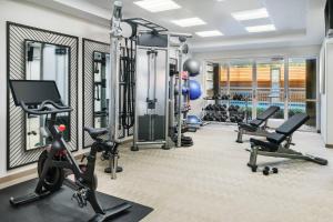 a gym with cardio equipment and treadmills at Courtyard by Marriott Orlando Downtown in Orlando