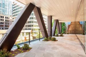 a view of the lobby of a building with tall buildings at Hotel EMC2, Autograph Collection in Chicago