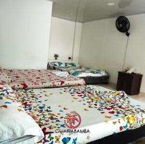Cama ou camas em um quarto em Quinta Guairabamba