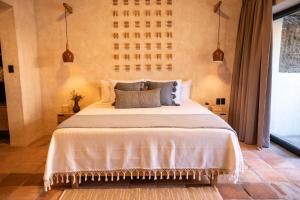 Llit o llits en una habitació de La Paranera Hotel & Relax