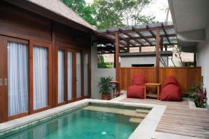 Bazén v ubytování AnandaDara Ubud Resort & Spa nebo v jeho okolí