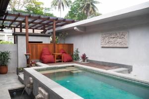 Bazén v ubytování AnandaDara Ubud Resort & Spa nebo v jeho okolí