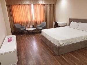 Giường trong phòng chung tại Phù Đổng Hotel Thanh Hóa