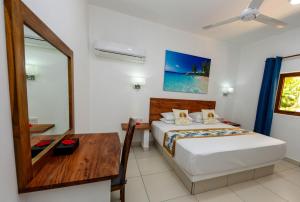 Ένα ή περισσότερα κρεβάτια σε δωμάτιο στο Lazio Beach Residence
