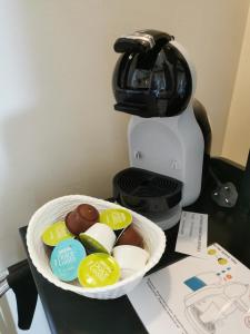 a bowl of food in front of a coffee maker at The Brownlow Stables in Leighton Buzzard