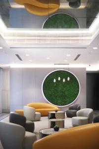 Uma área de estar em Lodgewood by Nina Hospitality Mong Kok