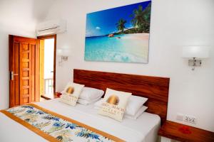 Ένα ή περισσότερα κρεβάτια σε δωμάτιο στο Lazio Beach Residence