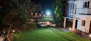 Magizham Homestay外面的花园