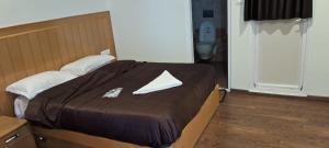 Magizham Homestay客房内的一张或多张床位