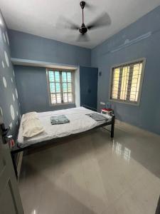 Ένα ή περισσότερα κρεβάτια σε δωμάτιο στο AR Beach Villa