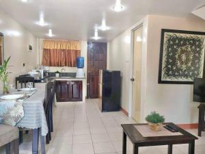 Kuchyň nebo kuchyňský kout v ubytování Pal-Watson Apartments