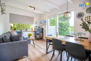 Posezení v ubytování Ferienhäuser Weerts Gatt Ferienhaus Lüttje Huske