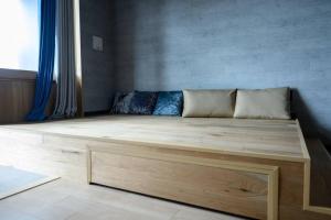 Yiyi Villa Awaji 淡路島西海岸夕日百選のvilla BBQ釣りゴルフ客房内的一张或多张床位