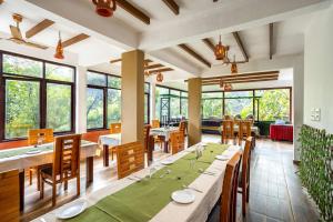 Posezení v ubytování Lakkidi Village Resort Wayanad