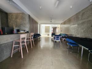 TV a/nebo společenská místnost v ubytování Serene Sands Villa