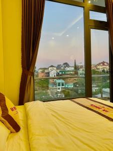 Postel nebo postele na pokoji v ubytování An Nhien Hotel