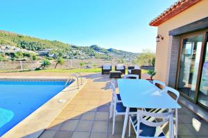 Photo de la galerie de l'établissement Marquesol - pri. pool villa with captivating hill views in Benitachell, à Benitachell