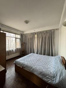 Dongol Residence客房内的一张或多张床位
