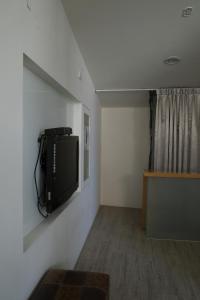 Sjónvarps- og/eða afþreyingartæki á Coral B&B