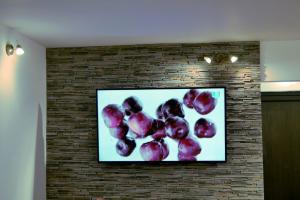 Cabana Pojorata tesisinde bir televizyon ve/veya eğlence merkezi