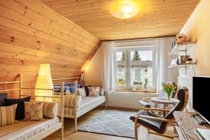 TV a/nebo společenská místnost v ubytování Ferienwohnung Fischer