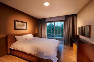 Postel nebo postele na pokoji v ubytování Eldorado Resort