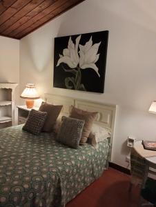 Ένα ή περισσότερα κρεβάτια σε δωμάτιο στο B&B Vigna Rosa