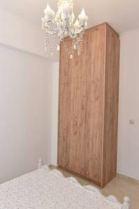 Postel nebo postele na pokoji v ubytování apartment irini