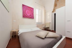Postel nebo postele na pokoji v ubytování B&B Corte Dei Taralli