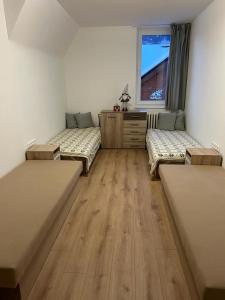 A seating area at Vila Lomnička