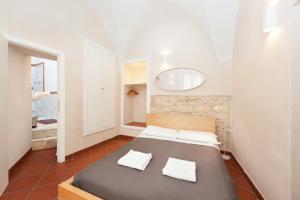 Postel nebo postele na pokoji v ubytování B&B Corte Dei Taralli
