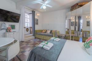 a living room with a couch and a table at Giamevi Sicily in Siracusa