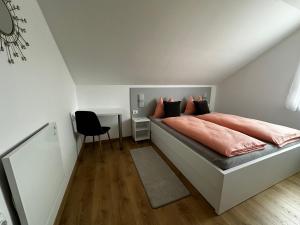 Postel nebo postele na pokoji v ubytování Apartmani Lotus Vrdnik